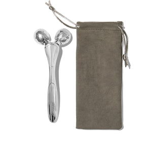 image packshot of contouring facial roller with little brown bag.