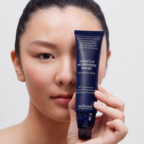 image mood of model holding Melume Skinscience's nightly morphing mask over her face