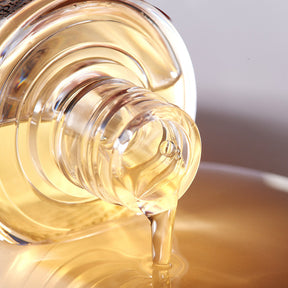 image mood of daily hydra lock resurface essence flowing out of bottle