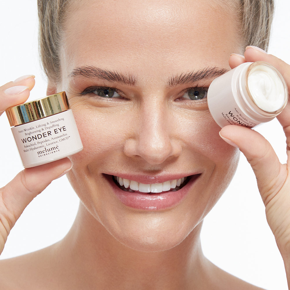 image mood model posing with two wonder eyes next to her face